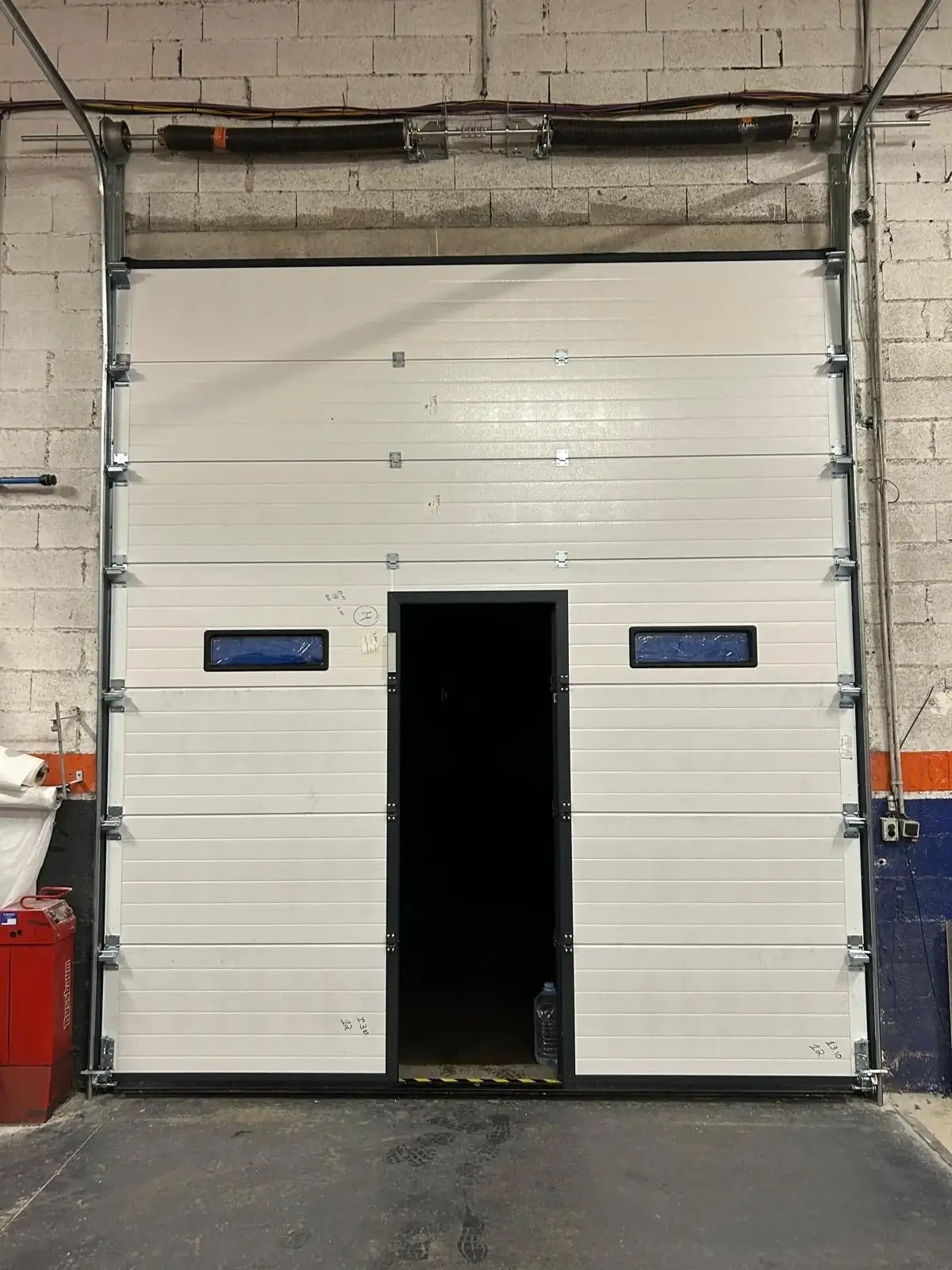 Motorisation d'une porte de garage enroulable à Montpellier